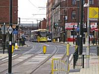 One of the first day trams at Rhodes Bank between Oldham Central and Mumps 27.01.2014.  Alwyn Smith